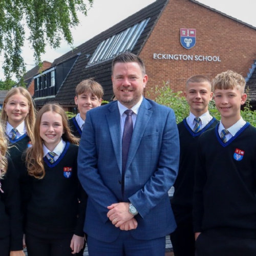 Headteacher Richard Cronin and students celebrating the latest Ofsted report